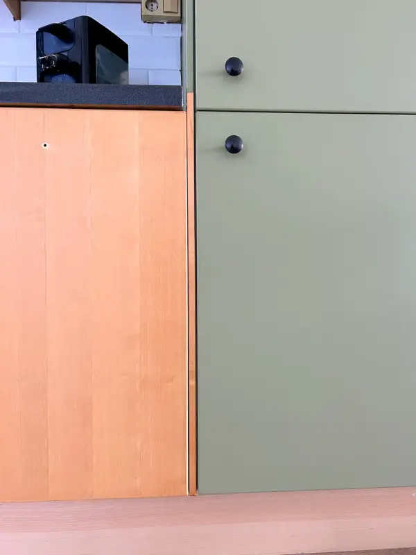 Tijdens: houten en groene fronten naast elkaar